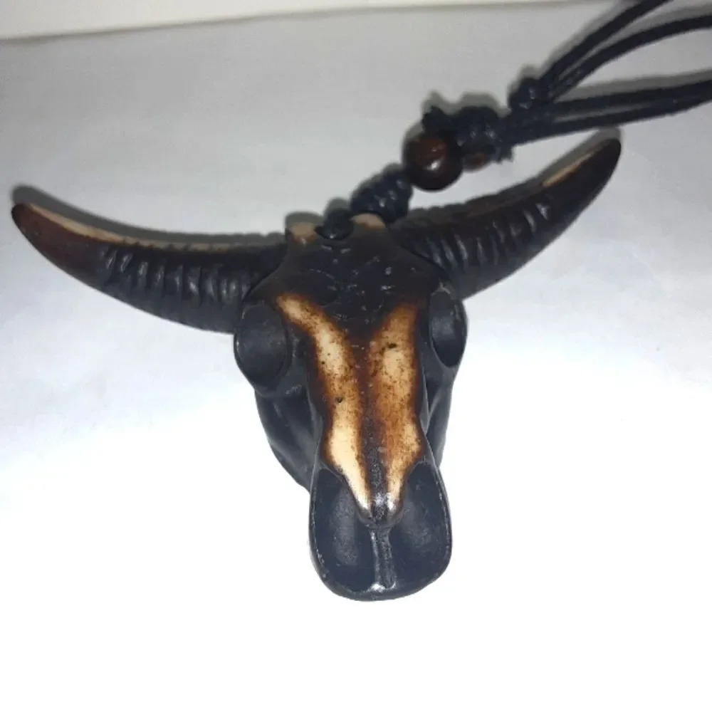 Hand CRAFTED UNISEX brown bull head pendant with adjustable necklace